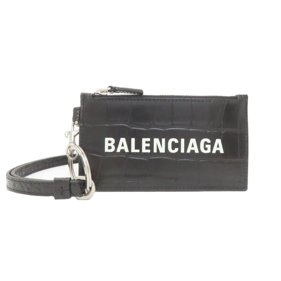 Balenciaga 594848 Coin Purse Card Case Leather: Balenciaga 594848 Coin Purse Card Case Leather Black leather card case with coin purse, designed by Balenciaga. The sleek and modern design features a signature on the exterior, adding a touch of eleg