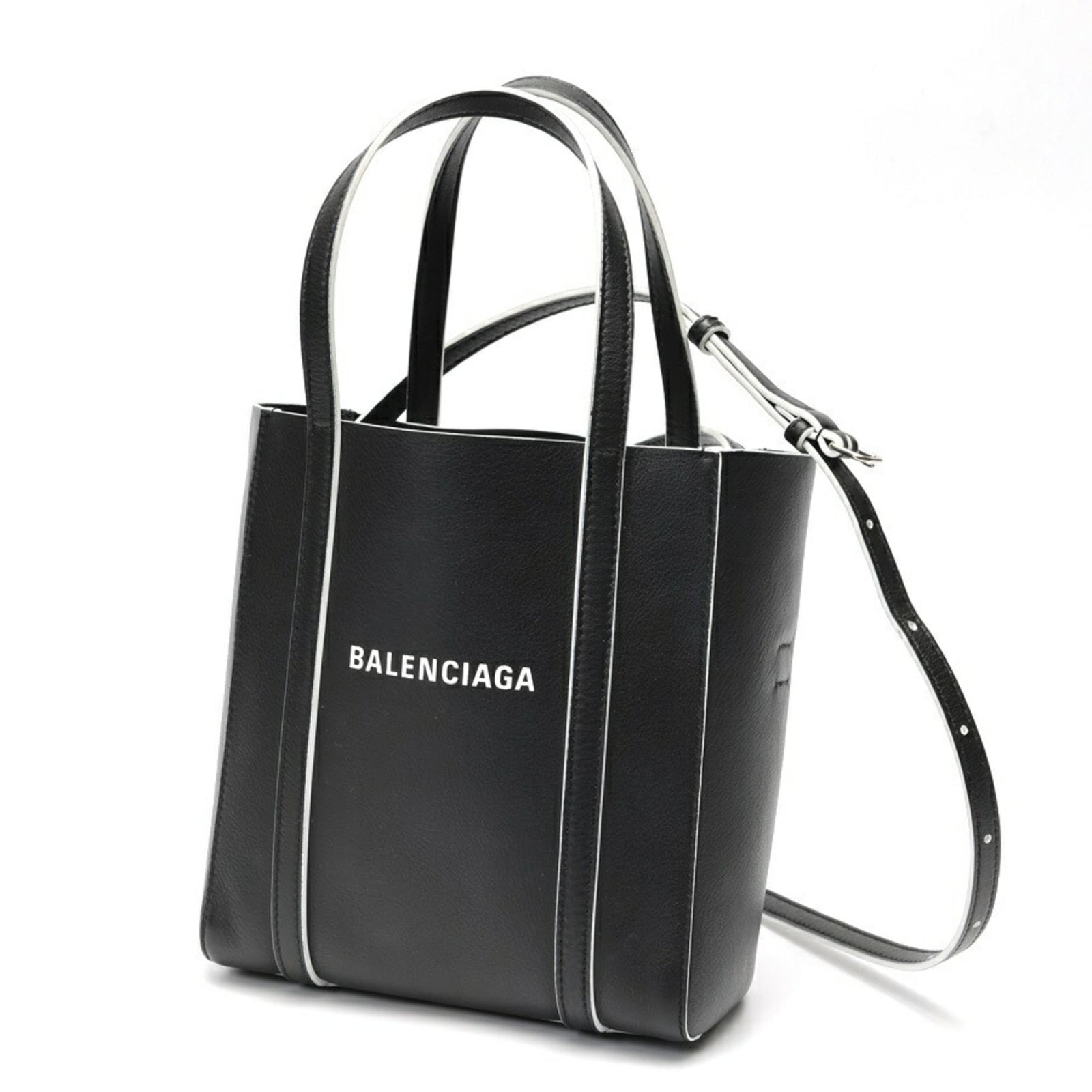 Bag tote bag leather shoulder bag: Bag tote bag leather shoulder bag This sleek leather shoulder bag features a timeless design with clean lines and a classic silhouette. Made from high-quality black leather, its durable construction e
