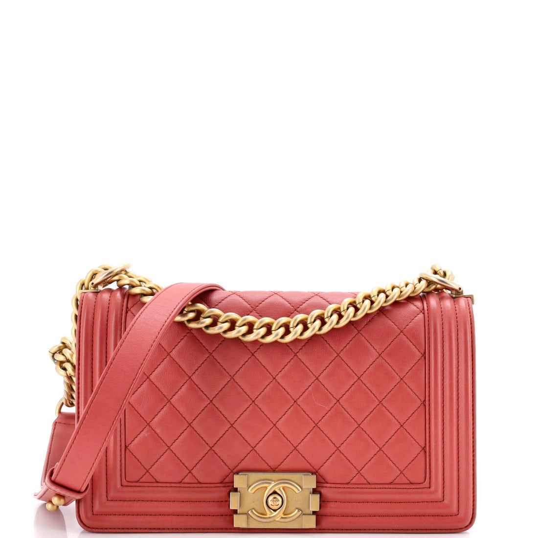 Quilted lambskin boy medium new bag flap: Quilted lambskin boy medium new bag flap Quilted lambskin exterior and pink interior make this medium Boy Flap Bag a stylish addition to any collection. The bag's new condition features minor scuffs, 