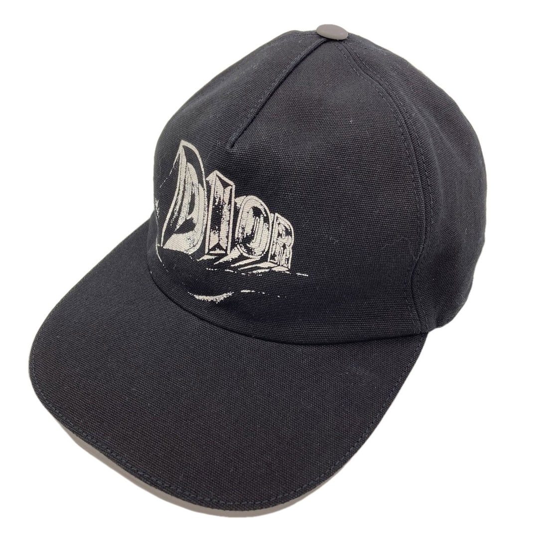 Cotton Christian Dior Hat Logo: Cotton Christian Dior Hat Logo Cotton Christian Dior Hat Logo - A classic black cotton hat featuring the iconic logo, showcasing the timeless style of the renowned fashion brand. Made from
