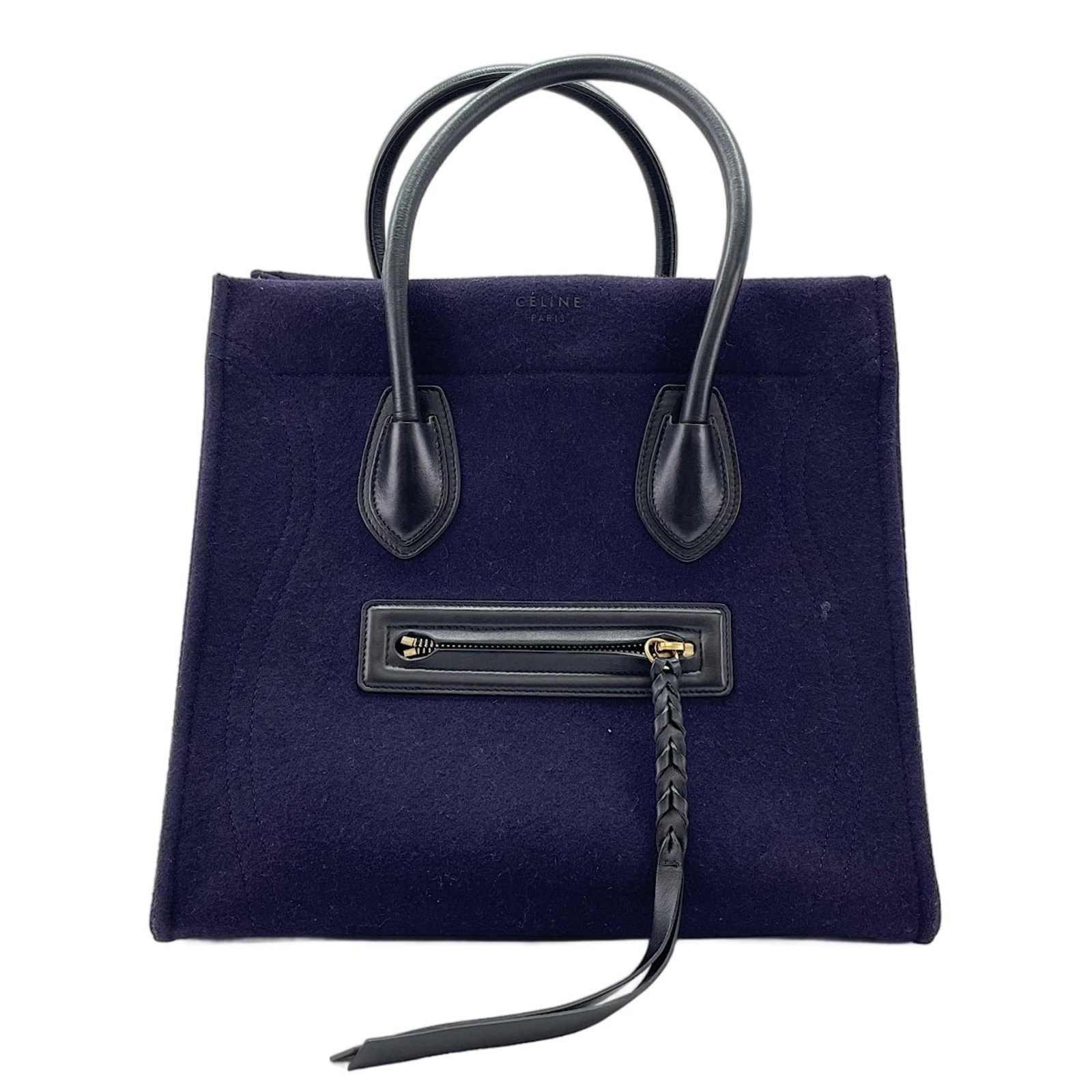 Handbag by Celine: Handbag by Celine Navy blue Celine handbag from Italy, measuring 29cm x 30cm x 26cm. This stylish bag features a classic design with clean lines and a sleek silhouette. Its navy color provides a
