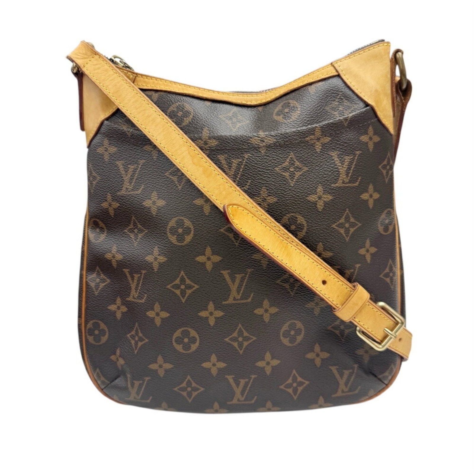 Shoulder Bag Monogram Canvas by Louis Vuitton: Shoulder Bag Monogram Canvas by Louis Vuitton Monogram canvas in brown, the iconic Louis Vuitton shoulder bag features a timeless design. Made from high-quality materials, its classic shape and signat