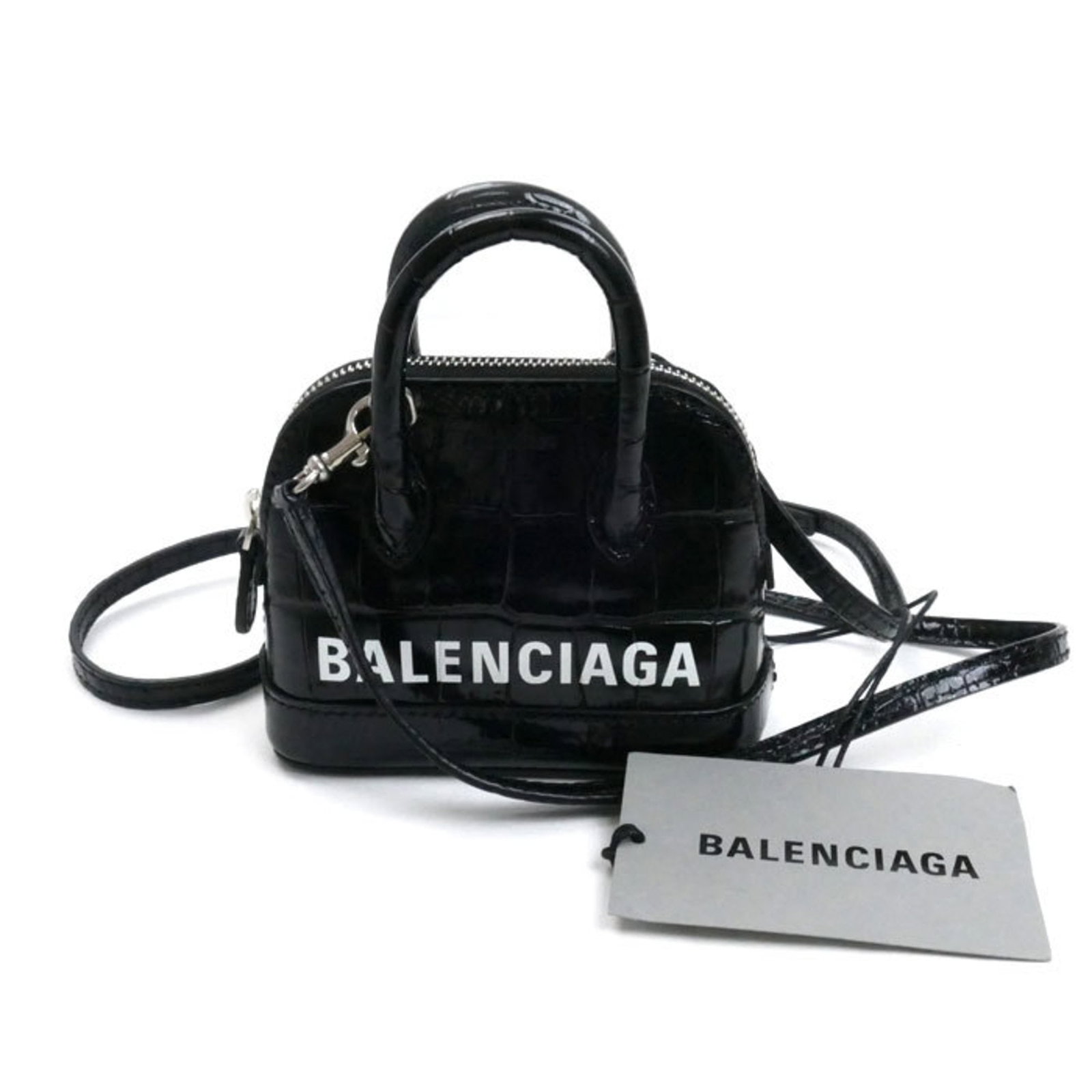 Balenciaga Shoulder Bag Leather: Balenciaga Shoulder Bag Leather Black leather shoulder bag from Balenciaga, featuring a sleek design with a dust bag and adjustable shoulder strap. This stylish accessory measures 9.5cm x 12cm x 5.5cm