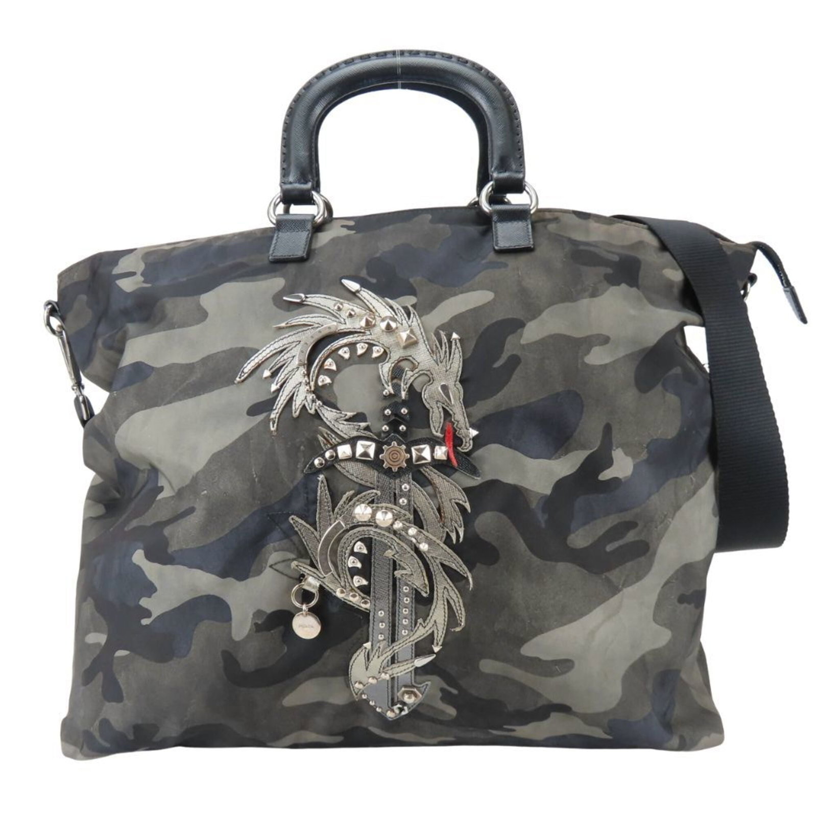 Nylon leather bag tote Prada: Nylon leather bag tote Prada Nylon leather bag tote from Prada, made in Italy with a durable nylon exterior and high-quality leather trim. This versatile bag measures 36cm x 39cm x 14.5cm and features