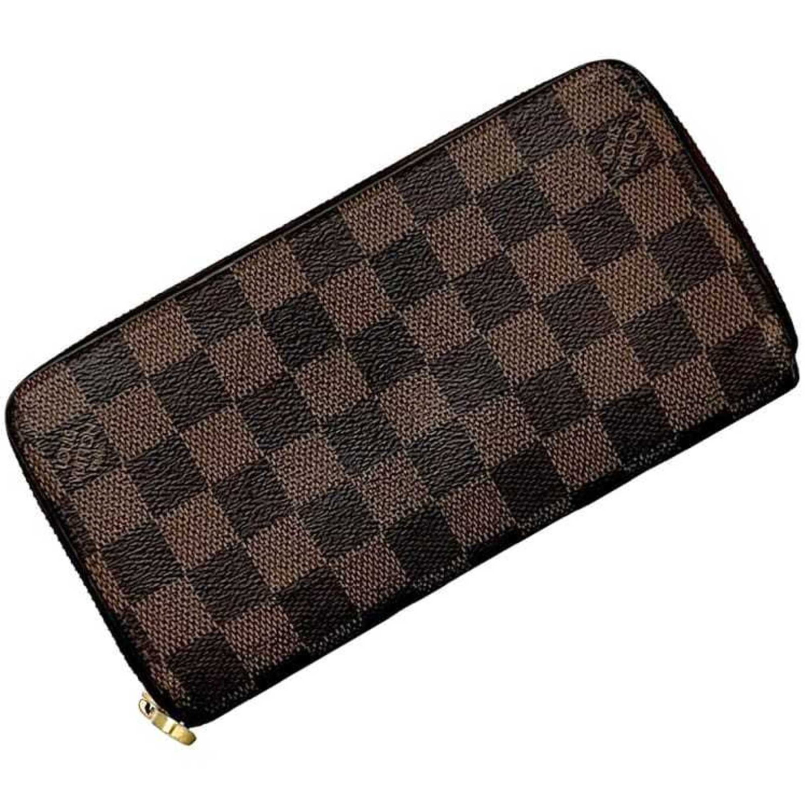 Louis Vuitton Coin Purse/ Coin Case Damier Canvas: Louis Vuitton Coin Purse/ Coin Case Damier Canvas Damier Canvas adds an iconic touch to this Louis Vuitton Coin Purse/ Coin Case, featuring the classic Ebene closure and a practical inner pocket with 