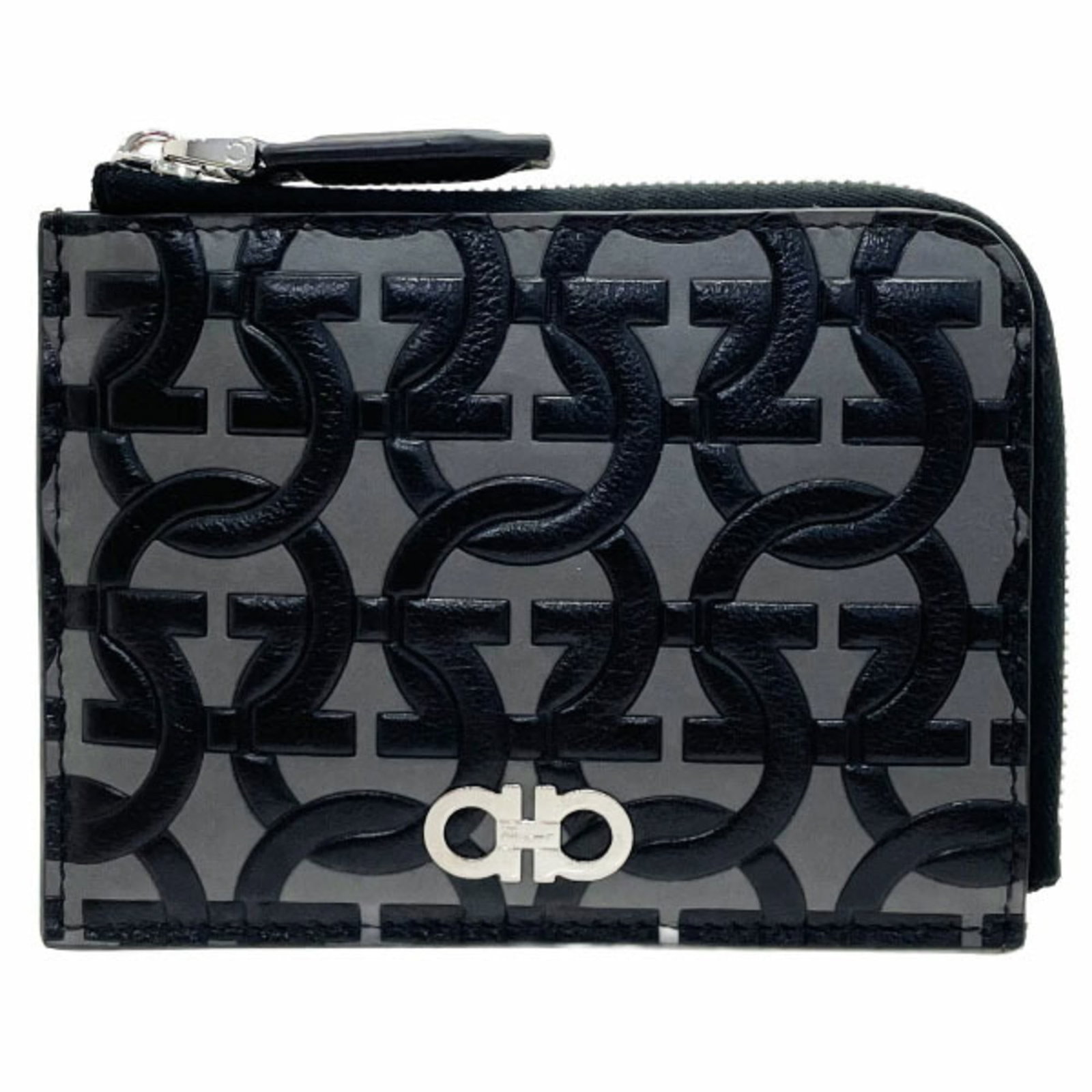 Coin purse leather case Salvatore Ferragamo coin: Coin purse leather case Salvatore Ferragamo coin Salvatore Ferragamo's iconic Gancini coin purse case, crafted from rich black calfskin leather and adorned with a sleek zipper closure. This elegant ac