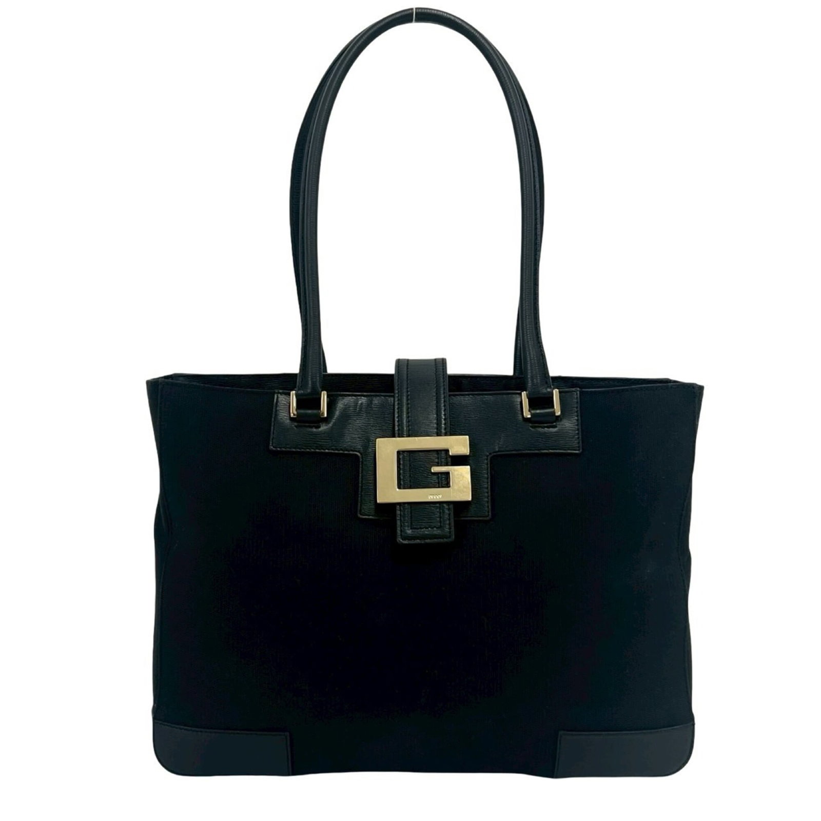 Gucci Handbag Tote Bag Canvas Leather: Gucci Handbag Tote Bag Canvas Leather Canvas and leather combine in this sleek Gucci tote bag, available in black. Measuring 24.5cm x 33cm x 6.5cm, it features a sturdy design with a signature touch. 
