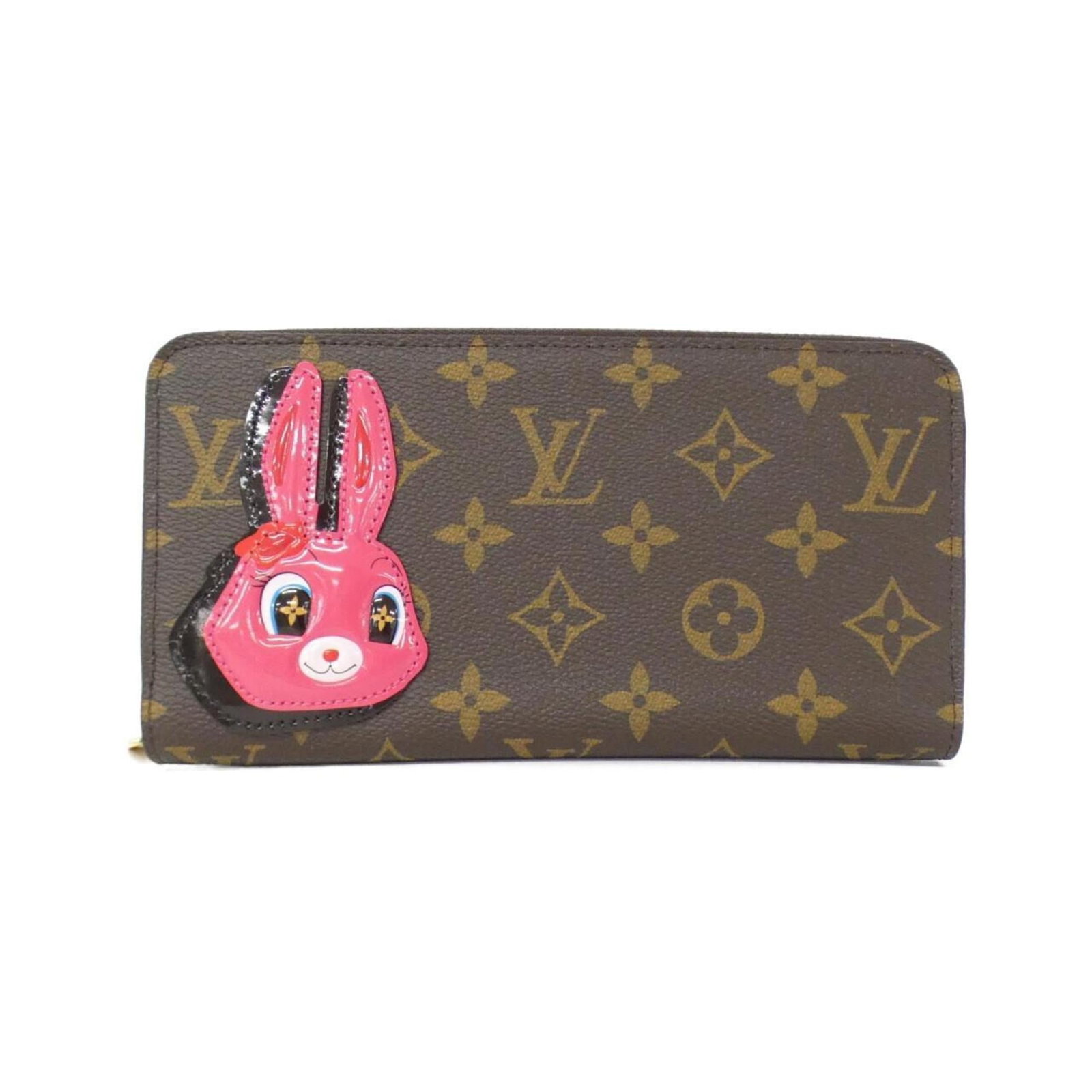 Long Wallet Bi fold Coated Canvas by Louis Vuitton: Long Wallet Bi fold Coated Canvas by Louis Vuitton Marron coated canvas, the signature style of Louis Vuitton, adorns this long wallet in bi-fold design. Measuring 10cm x 19cm x 2cm, it comes with a d