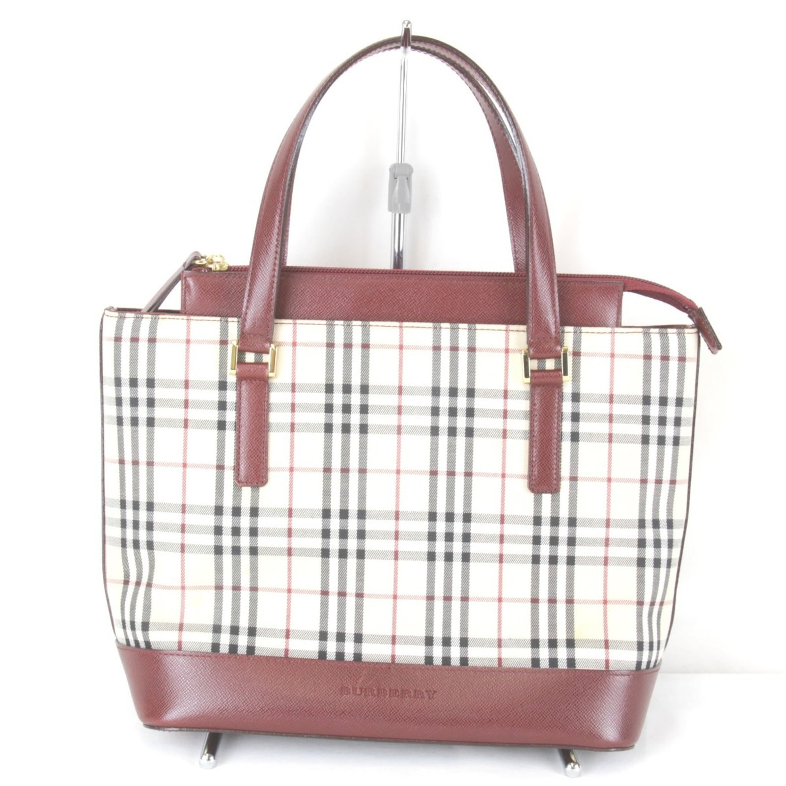 Canvas Handbag Leather: Canvas Handbag Leather Canvas Handbag Leather - A stylish and versatile red leather handbag with a zipper closure, featuring a canvas body and adjustable handle. Measuring 23cm x 30cm x 11cm, it's