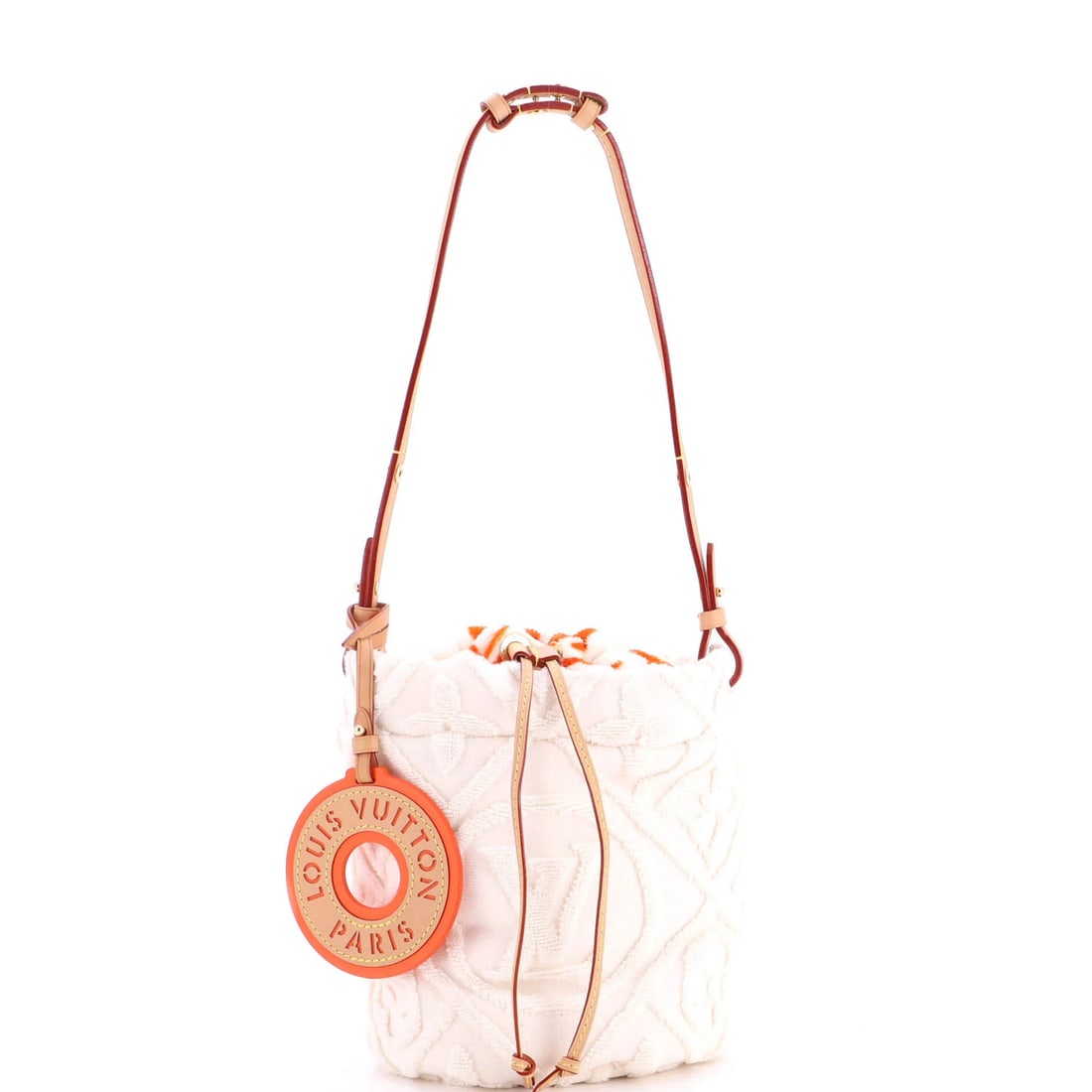 Terry cloth Louis Vuitton LVacation bucket bag: Terry cloth Louis Vuitton LVacation bucket bag Terry cloth exterior adds a tactile touch to the classic Louis Vuitton LVacation bucket bag, featuring neutral tones and gold hardware. Measuring 8" x 7"