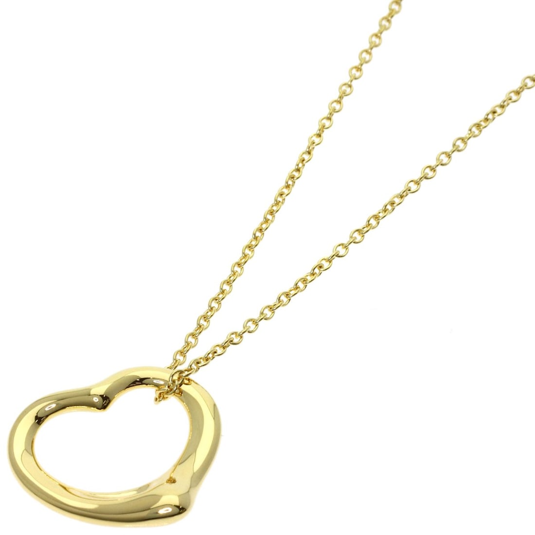 Yellow gold necklace open heart Tiffany Co: Yellow gold necklace open heart Tiffany Co K18 yellow gold necklace with an open heart design, bearing the signature of Tiffany Co. Item Specifics: Brand: TIFFANY&Co. Style: Necklace Material: K18 Yel