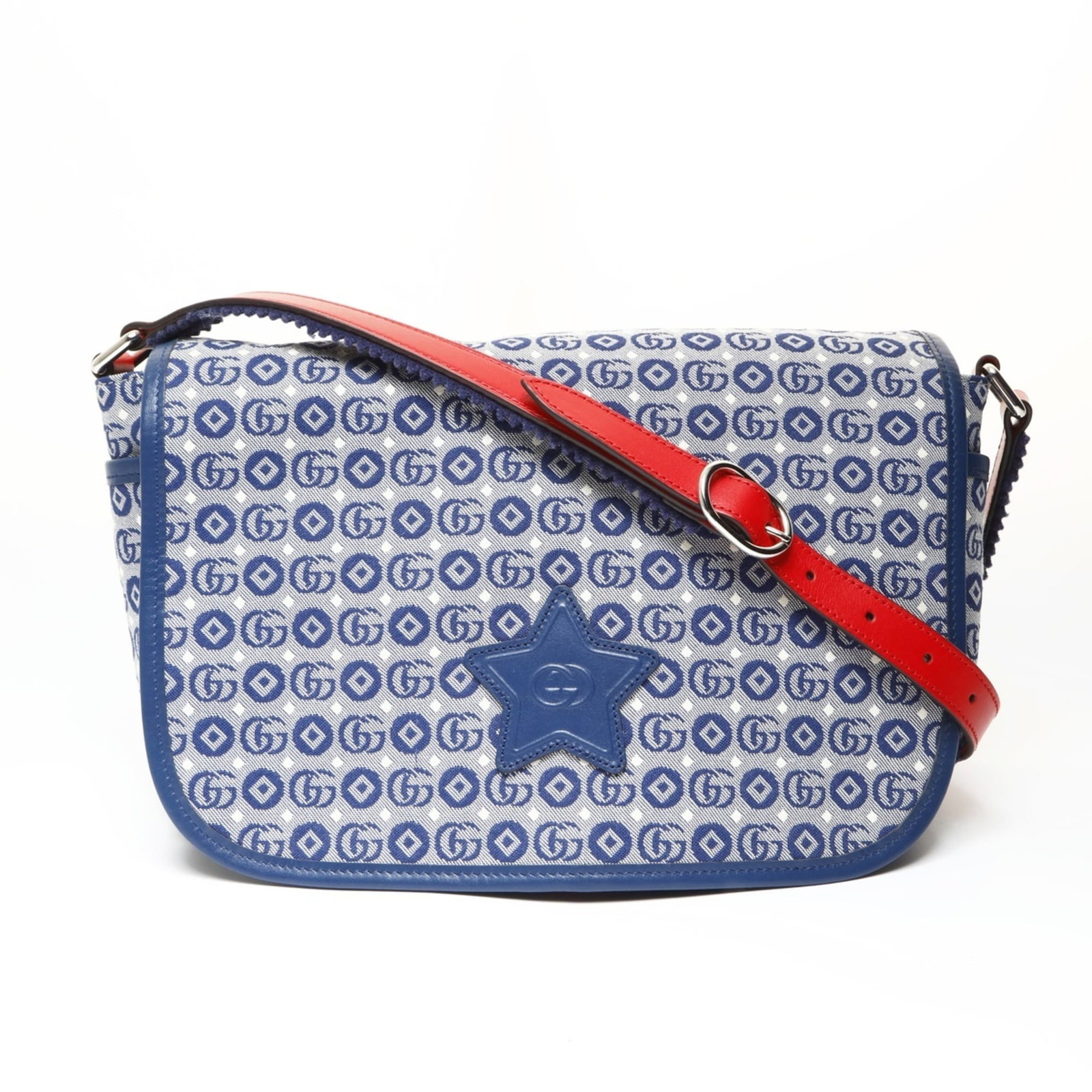 Canvas bag Gucci shoulder: Canvas bag Gucci shoulder Gucci's iconic GG canvas shoulder bag features a vibrant blue hue and a sturdy button closure. Measuring 21cm x 33cm x 8cm, the bag boasts a spacious interior with adjustable