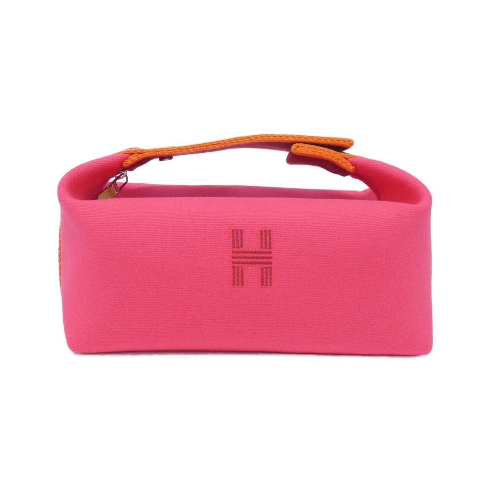 Canvas pouch by Hermes: Canvas pouch by Hermes Canvas pouch by Hermes, featuring high-quality canvas material and silver hardware. This stylish accessory measures 11.5cm x 20.5cm x 12cm and comes in a luxurious box. A beauti