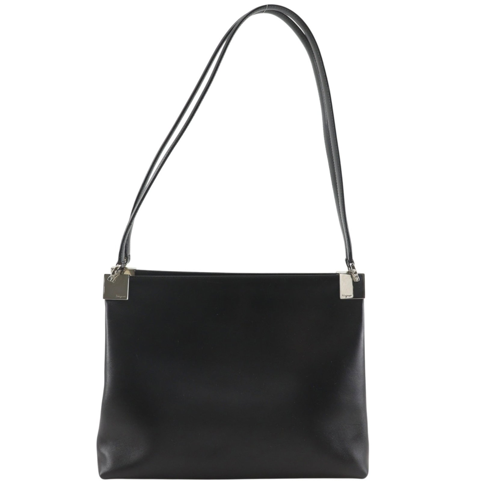 Salvatore Ferragamo Leather Tote Bag: Salvatore Ferragamo Leather Tote Bag Black leather tote bag with signature from Salvatore Ferragamo, measuring 22cm x 28cm x 13cm and weighing 660g. The EF-21 9641 model features a classic design with