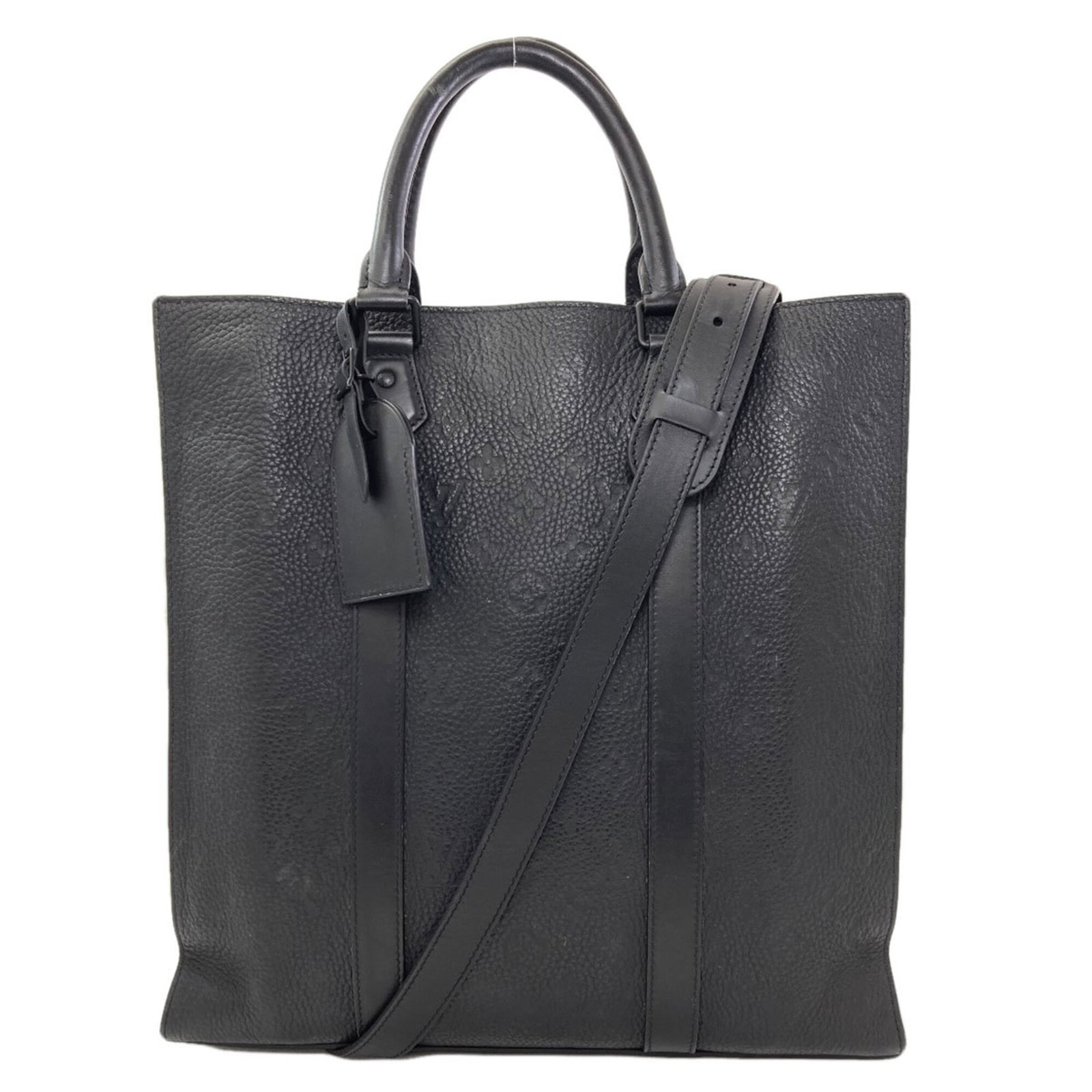 Louis Vuitton Tote Bag: Louis Vuitton Tote Bag Louis Vuitton's iconic tote bag boasts a sleek Noir color and compact dimensions, measuring 37cm x 36cm x 8cm. The M21866 model showcases the brand's signature monogram pattern,