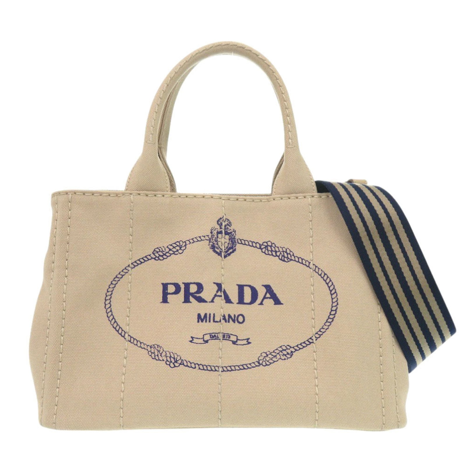 Canvas tote bag by Prada: Canvas tote bag by Prada Canvas tote bag by Prada, made from high-quality canvas and featuring a timeless beige color. The bag's classic design is complemented by a sturdy shoulder strap, perfect for 