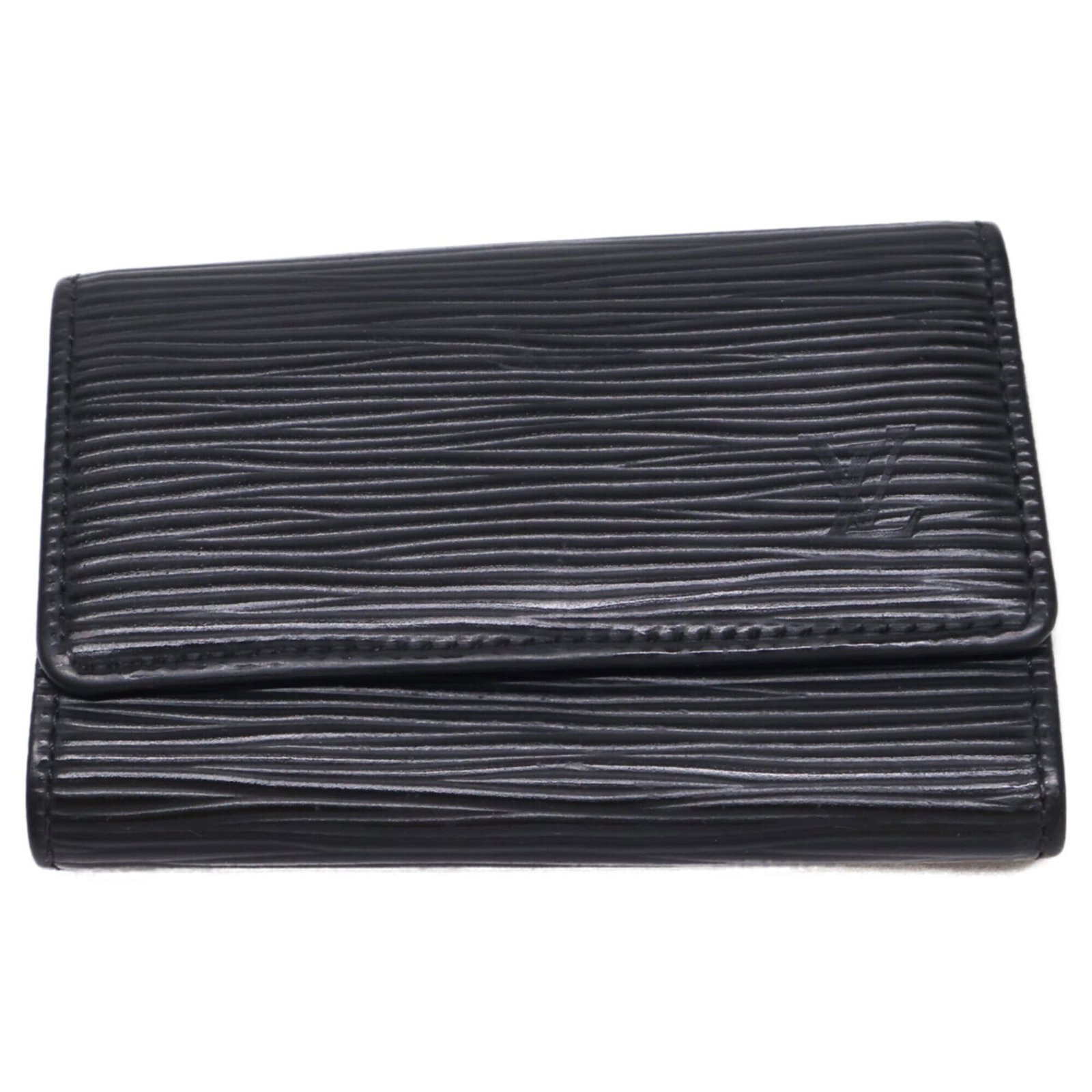 Keycase Epi Leather Louis Vuitton: Keycase Epi Leather Louis Vuitton The Keycase Epi Leather Louis Vuitton boasts sleek, black Epi leather construction with precise dimensions of 11cm x 7cm x 1cm. This compact keycase features the icon