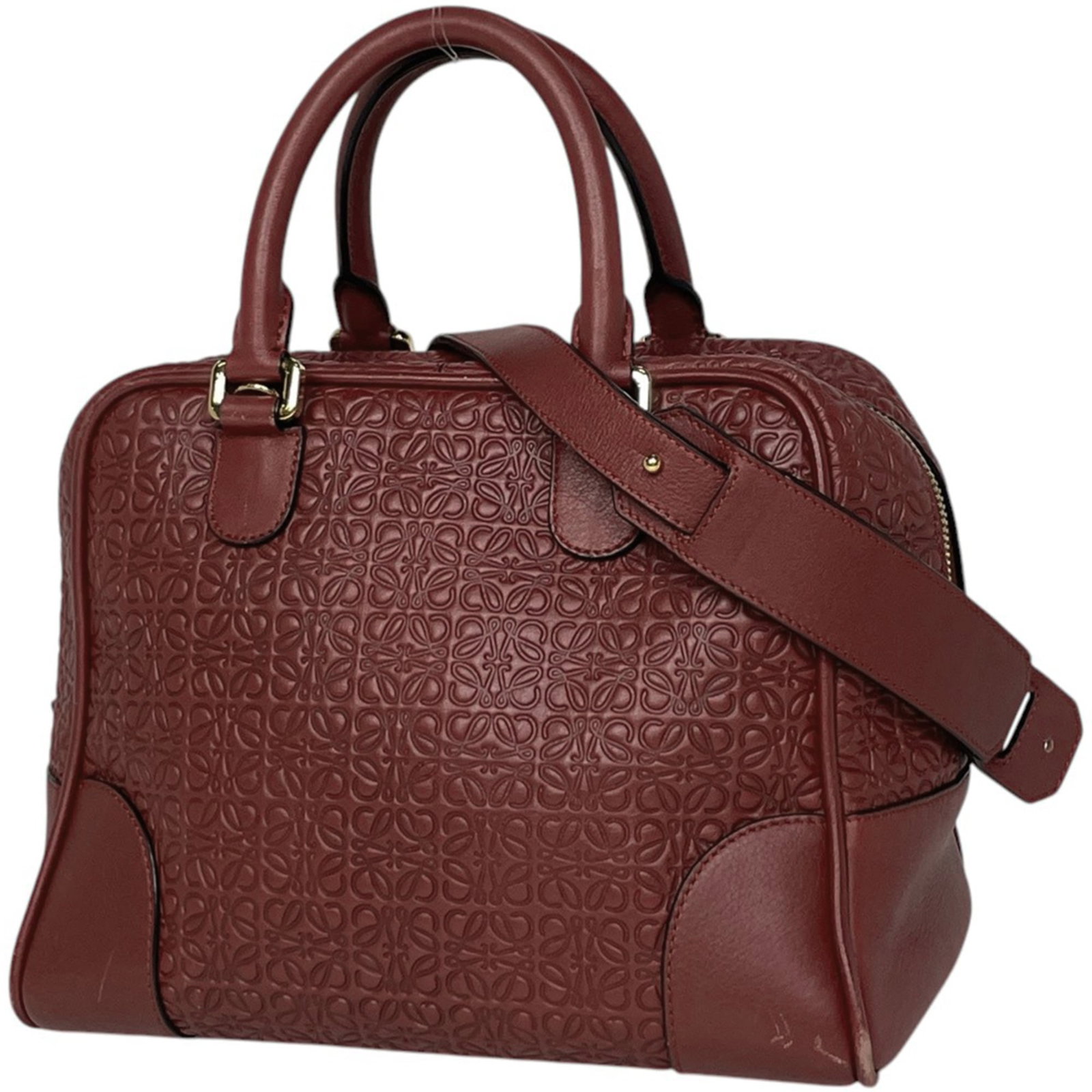 Handbag Leather from Loewe: Handbag Leather from Loewe Red Loewe Handbag with Leather Material. This women's handbag measures 21cm x 28cm x 16cm and features a striking red color. Made from high-quality leather, its classic desi