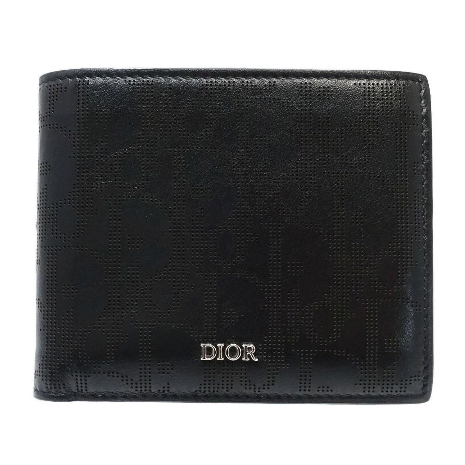 Christian Dior Bi Fold Leather Wallet: Christian Dior Bi Fold Leather Wallet Christian Dior's Bi Fold Leather Wallet is a sleek and sophisticated accessory, crafted from high-quality black leather. Measuring 9.5cm x 11.5cm x 2cm, it featur