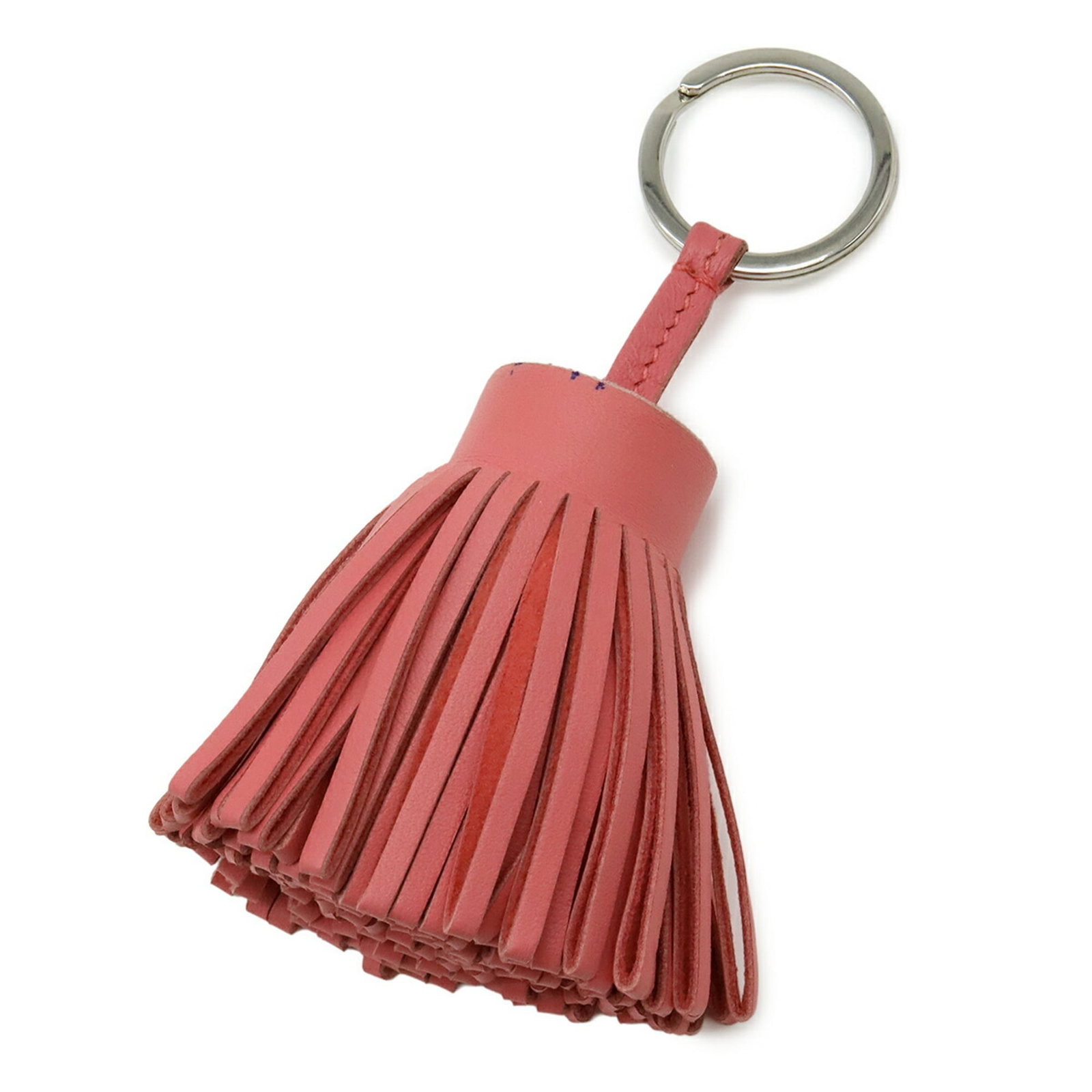 Keyring Agneau Hermes Milo: Keyring Agneau Hermes Milo Agneau Milo keyring from Hermes, a pink accessory. This item comes with a box and bears a signature. The Agneau Milo material adds a touch of elegance to this stylish keyrin