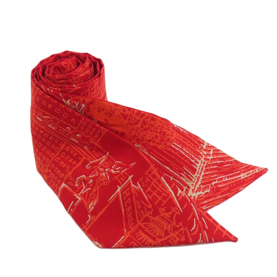 Hermes Twilly Silk Scarf: Hermes Twilly Silk Scarf Red Twilly Silk Scarf from Hermes. Made from high-quality silk, this scarf features a classic red color and bears the signature of the renowned fashion house. A timeless acces