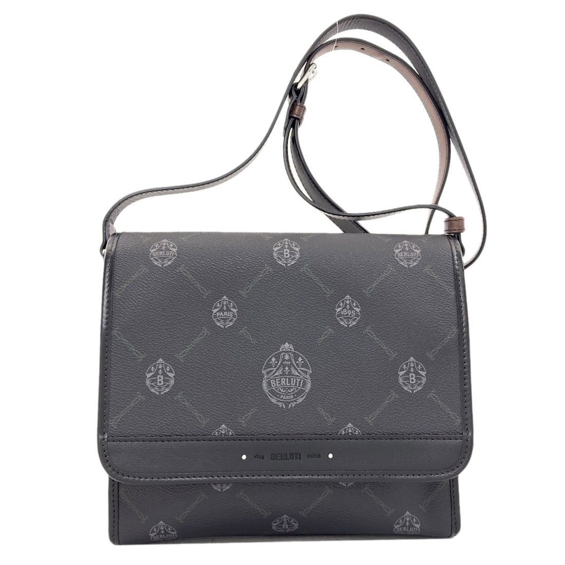Shoulder bag logo pvc berluti: Shoulder bag logo pvc berluti Black PVC Berluti shoulder bag with logo. Made from PVC, this black shoulder bag features the iconic Berluti logo. The simple design makes it a versatile accessory for ev
