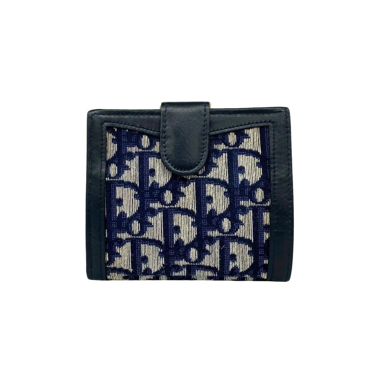 Canvas leather bi-fold wallet by Christian Dior: Canvas leather bi-fold wallet by Christian Dior Canvas leather bi-fold wallet by Christian Dior, featuring navy color and canvas, leather construction. This bi-fold wallet measures 9.5cm x 11.5cm x