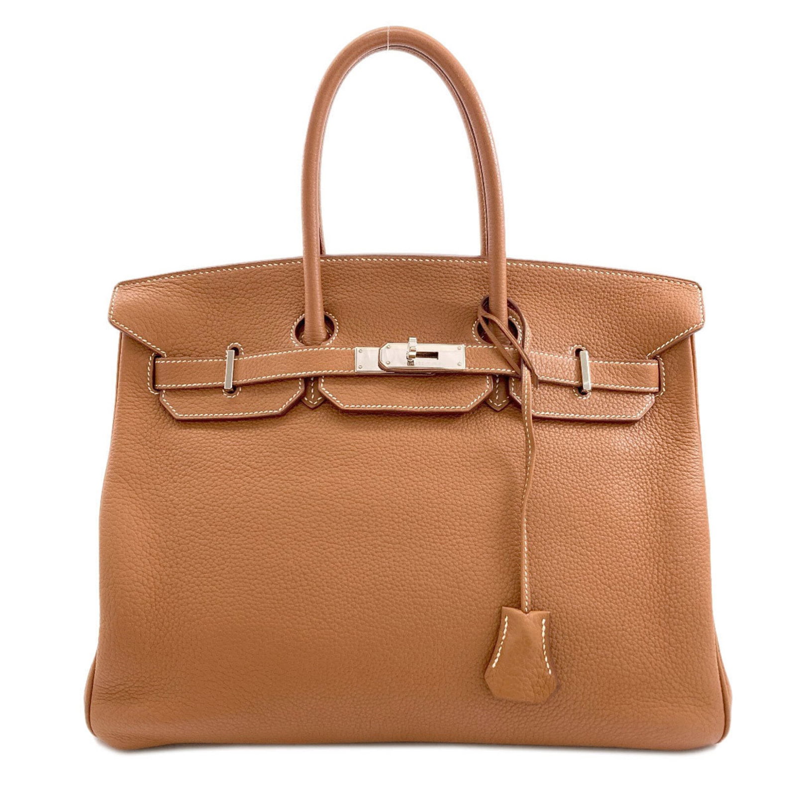 Clemence Leather Handbag Taurillon Hermes: Clemence Leather Handbag Taurillon Hermes Taurillon clemence leather gives this gold brown Herm?s handbag its distinctive look and feel, with a sizeable 25cm x 35cm x 18.5cm / 9.84'' x 13.77'' x 7.28'