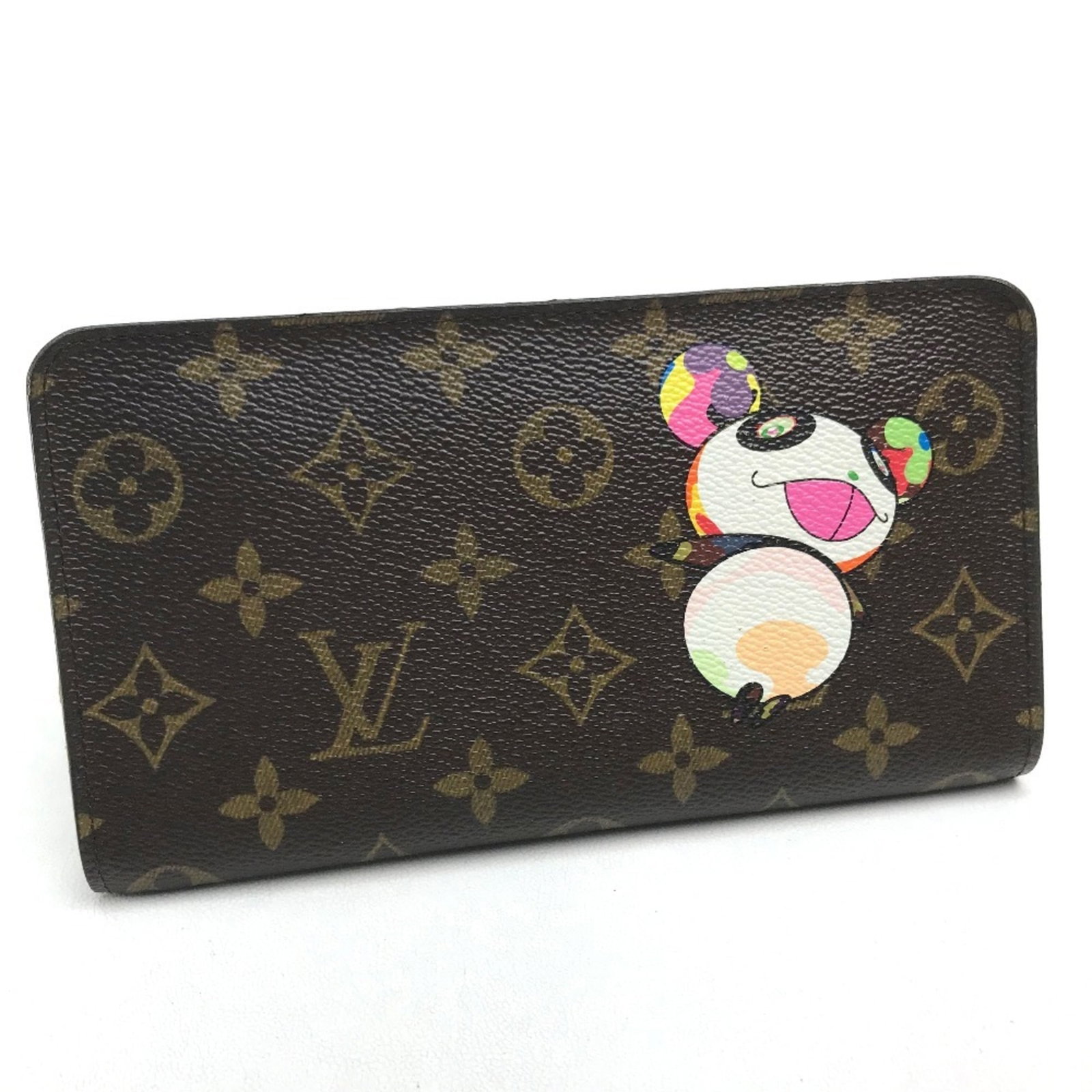 Louis Vuitton Monogram Bi Fold Long Wallet: Louis Vuitton Monogram Bi Fold Long Wallet Monogrammed luxury at its finest, the Louis Vuitton Monogram Bi Fold Long Wallet boasts sleek design and premium materials. Crafted with iconic monogram patt