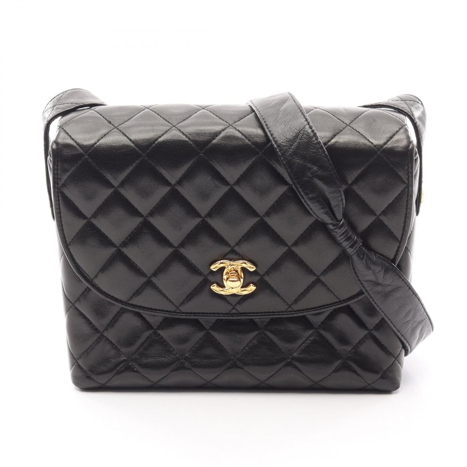 Chanel Handbag Shoulder Bag Leather: Chanel Handbag Shoulder Bag Leather Black lambskin leather Chanel shoulder bag with gold hardware, measuring 19cm x 22cm x 7.5cm. This stylish and classic design showcases the iconic brand's signature