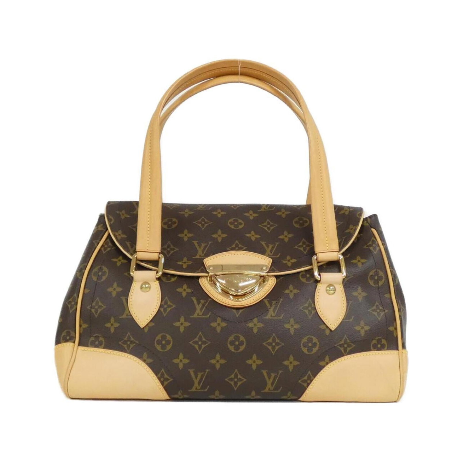 Monogram Louis Vuitton Shoulder Bag: Monogram Louis Vuitton Shoulder Bag Monogram Louis Vuitton Shoulder Bag in Marron features the iconic monogram pattern, a timeless design element of the brand. The bag's classic shape and size make it