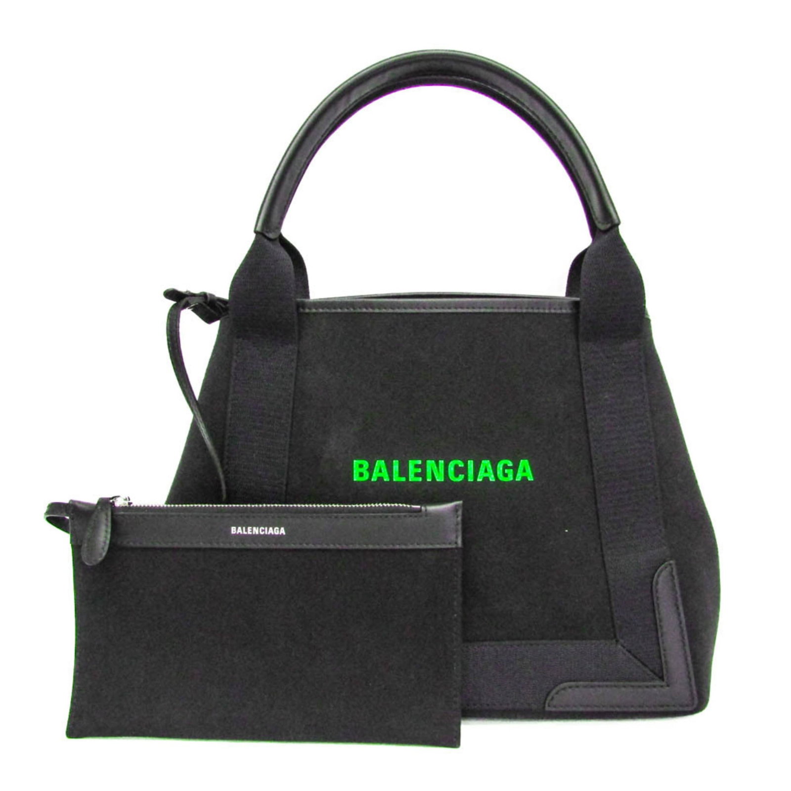 Canvas leather bag tote from Balenciaga: Canvas leather bag tote from Balenciaga Canvas leather bag tote from Balenciaga, featuring a classic design with a navy cabas style. This stylish bag boasts an open closure and has a spacious inner po