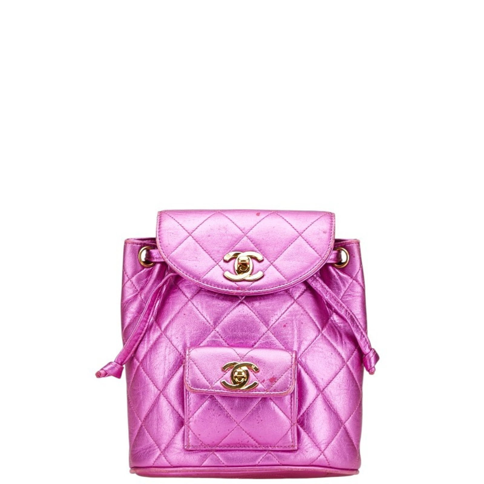 Leather Backpack by Chanel: Leather Backpack by Chanel Leather Backpack by Chanel - A stylish and sophisticated accessory, this lambskin backpack features metallic pink leather and gold hardware for a chic, high-end look. Made f