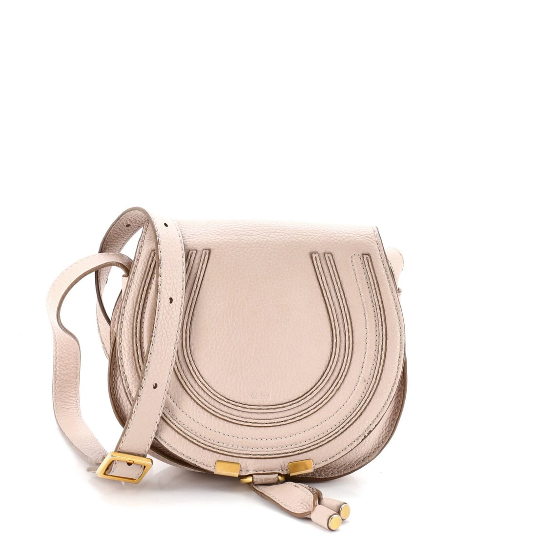 Small Leather Crossbody Bag by Marcie Chloe: Small Leather Crossbody Bag by Marcie Chloe This neutral-toned leather crossbody bag by Marcie Chloe features a small size with a handle drop of 20-24". The exterior shows signs of wear, including scu