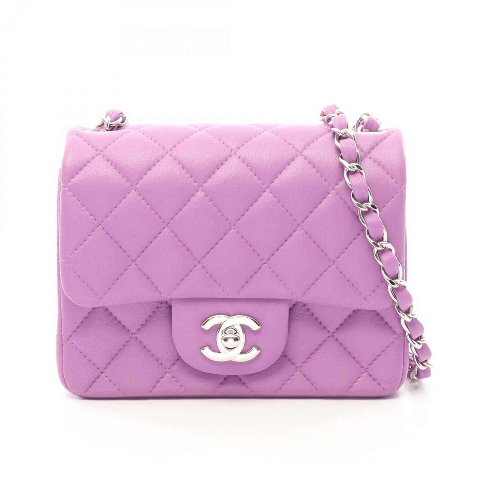 Chanel Handbag Shoulder Bag Leather: Chanel Handbag Shoulder Bag Leather Chanel's iconic shoulder bag features rich, luxurious lambskin leather in a deep purple hue. The sleek design and silver hardware add a touch of sophistication to t