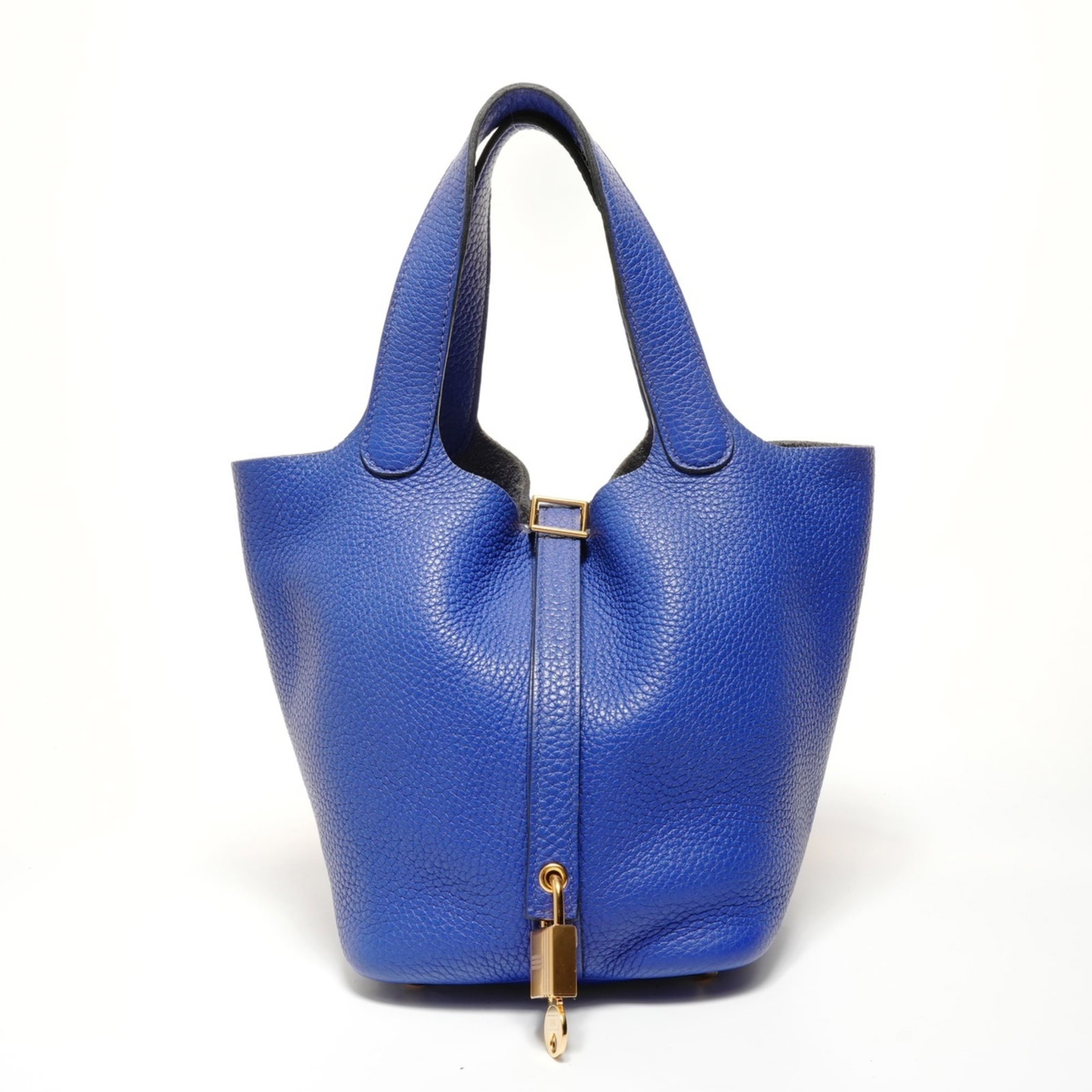 Handbag by Hermes: Handbag by Hermes Blue Picotin handbag by Hermes, featuring a compact size and sleek design. The bag measures 18cm x 18cm x 13cm and has a handle drop of 12cm, making it perfect for everyday use. Its 