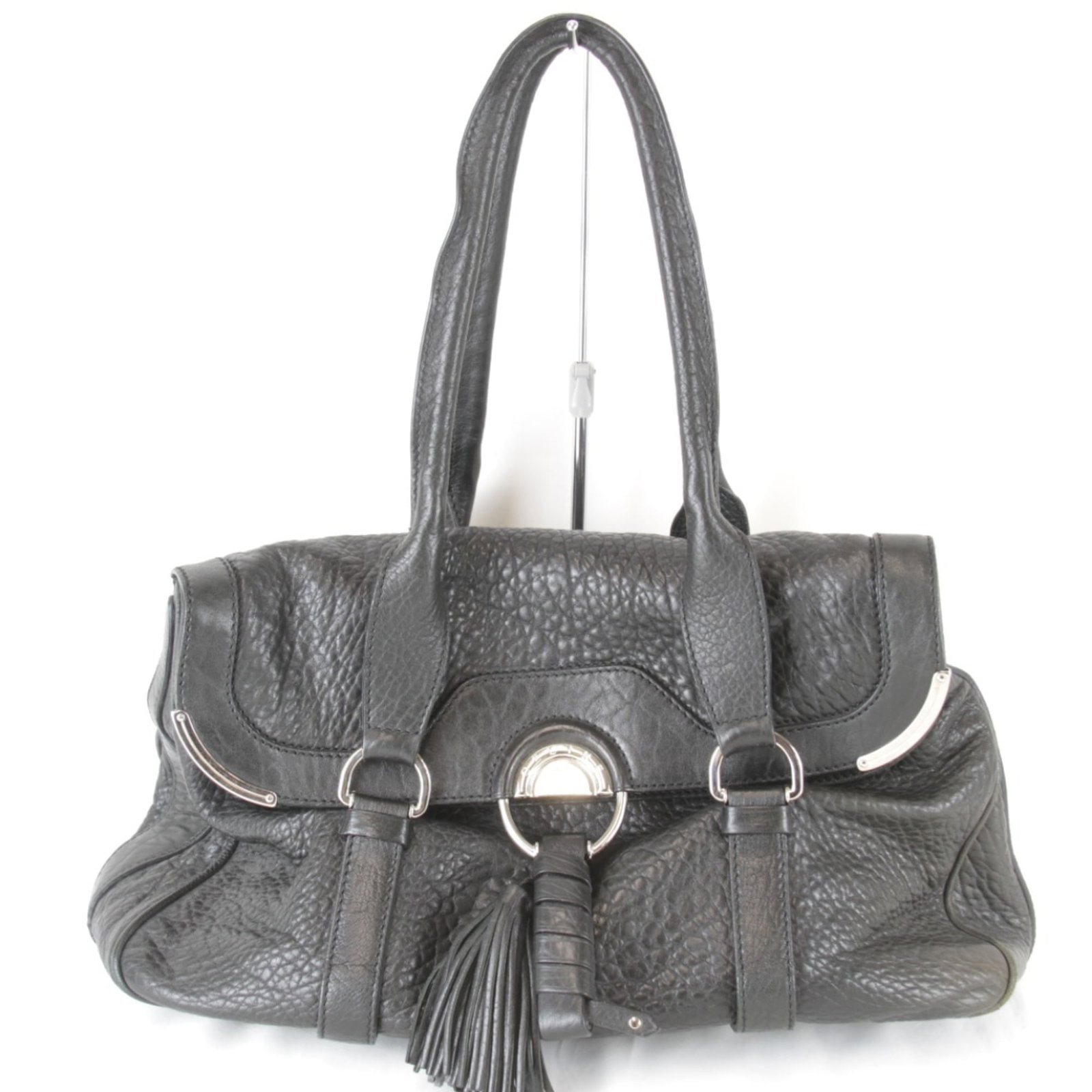 Celine Tote Bag Leather: Celine Tote Bag Leather Black leather Celine tote bag with a flap closure, measuring 27cm x 35cm x 20cm and featuring a 73cm long handle. This stylish tote boasts a sleek design and premium leather co