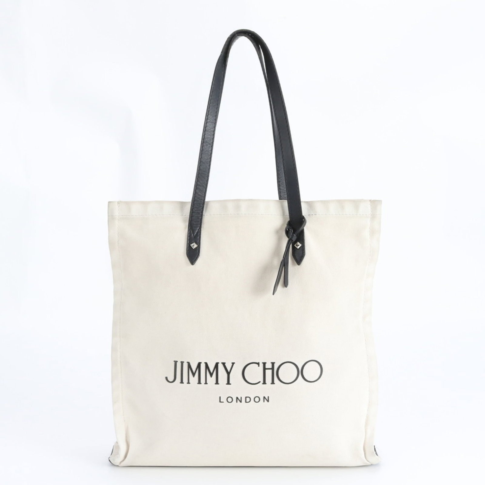 Jimmy Choo Handbag Tote Bag Leather Canvas: Jimmy Choo Handbag Tote Bag Leather Canvas Jimmy Choo's iconic handbag tote bag boasts sleek black leather and canvas accents, adding a touch of sophistication to any outfit. Measuring 38cm x 38cm x 8