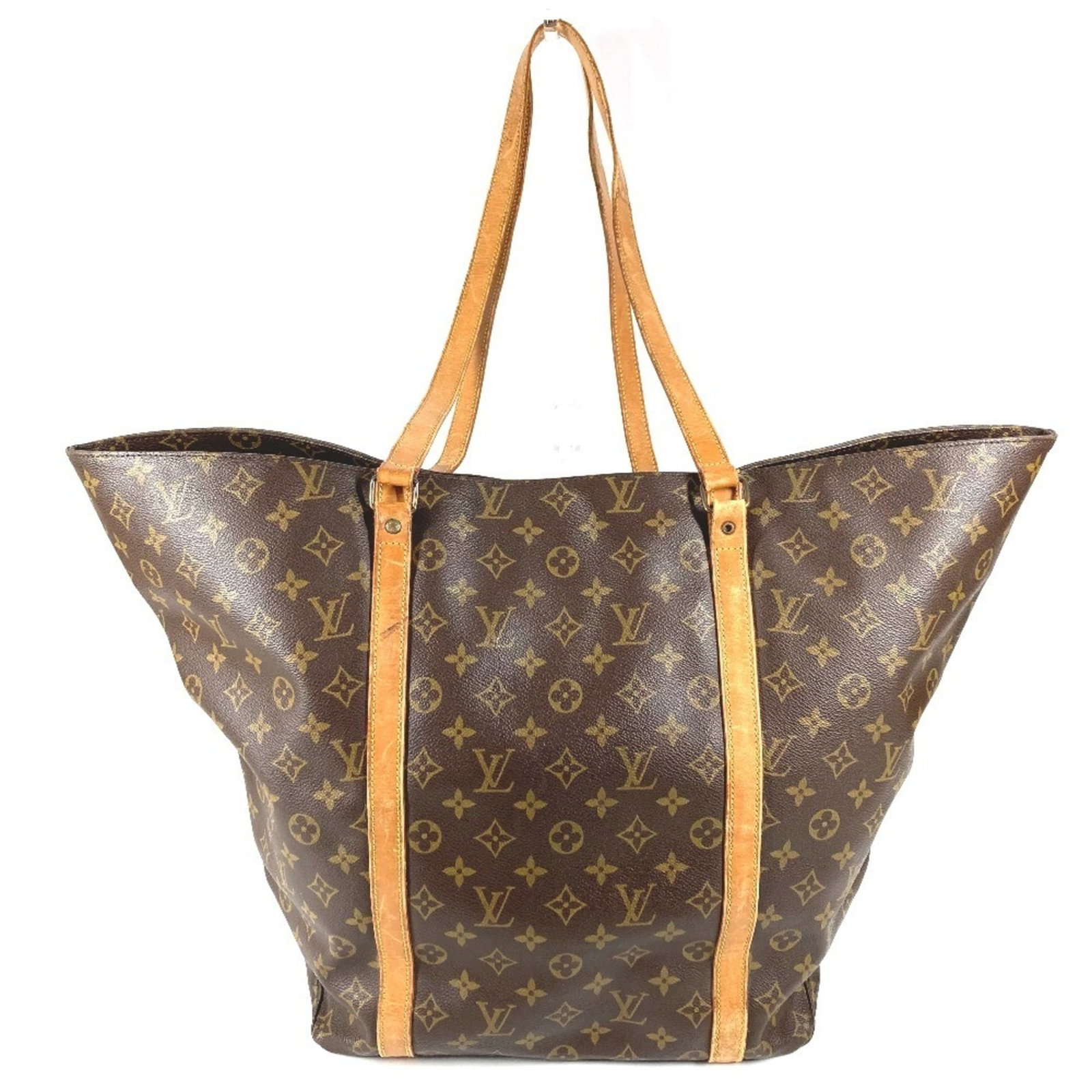 Shoulder Bag Monogram Louis Vuitton Tote: Shoulder Bag Monogram Louis Vuitton Tote The Louis Vuitton Monogram shoulder bag tote boasts classic style with its timeless brown monogram pattern, crafted from high-quality materials. Measuring 37.5