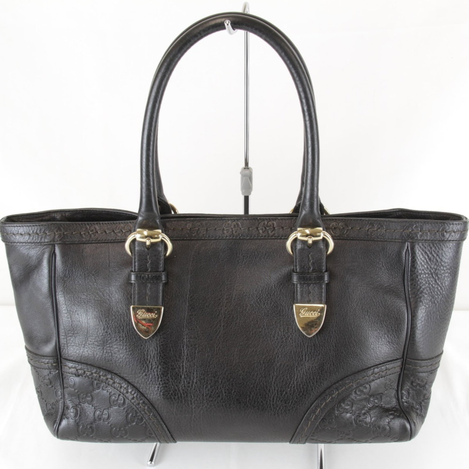 Tote bag gg leather: Tote bag gg leather GG leather tote bag with sleek black finish, featuring a magnet closure and sturdy handle for everyday use. Measuring 20cm x 32cm x 12cm, it weighs 1.05kg and has a comfortable han