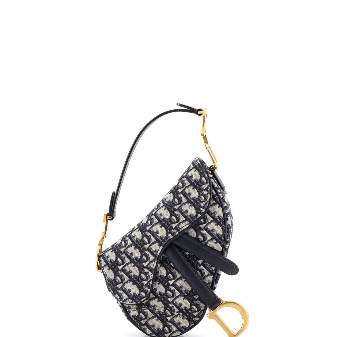 Canvas mini handbag saddle Oblique Christian Dior: Canvas mini handbag saddle Oblique Christian Dior Canvas mini handbag saddle Oblique Christian Dior features a striking blue canvas exterior with neutral interior, adorned with aged gold hardware. The