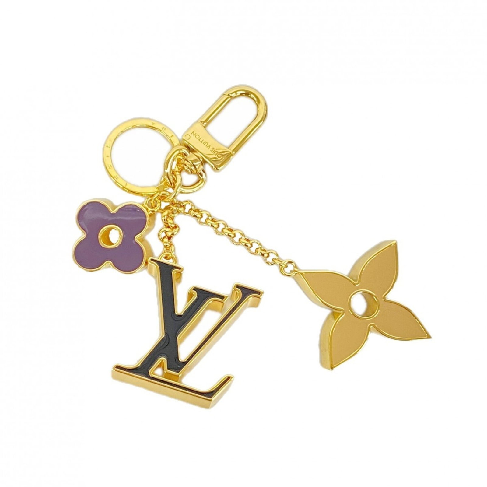 Keyring by Louis Vuitton: Keyring by Louis Vuitton This Louis Vuitton keyring boasts sleek design and subtle sophistication, with its classic monogram pattern adding a touch of timeless elegance to any outfit. Made from high-q