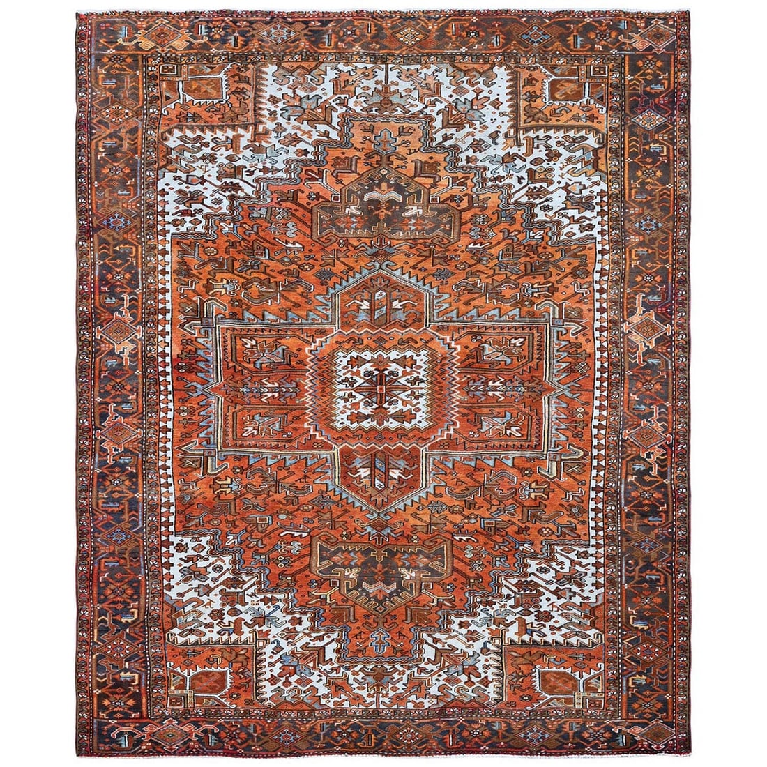 10'x12' Burnt Orange Vintage Zoroastrian Heris Hand Knotted Pure Wool Rug: 10'x12' Burnt Orange Vintage Zoroastrian Heris Hand Knotted Pure Wool Rug The Burnt Orange Heris Hand Knotted Pure Wool Rug boasts a striking geometric pattern in a rich, burnt orange hue. Made from h