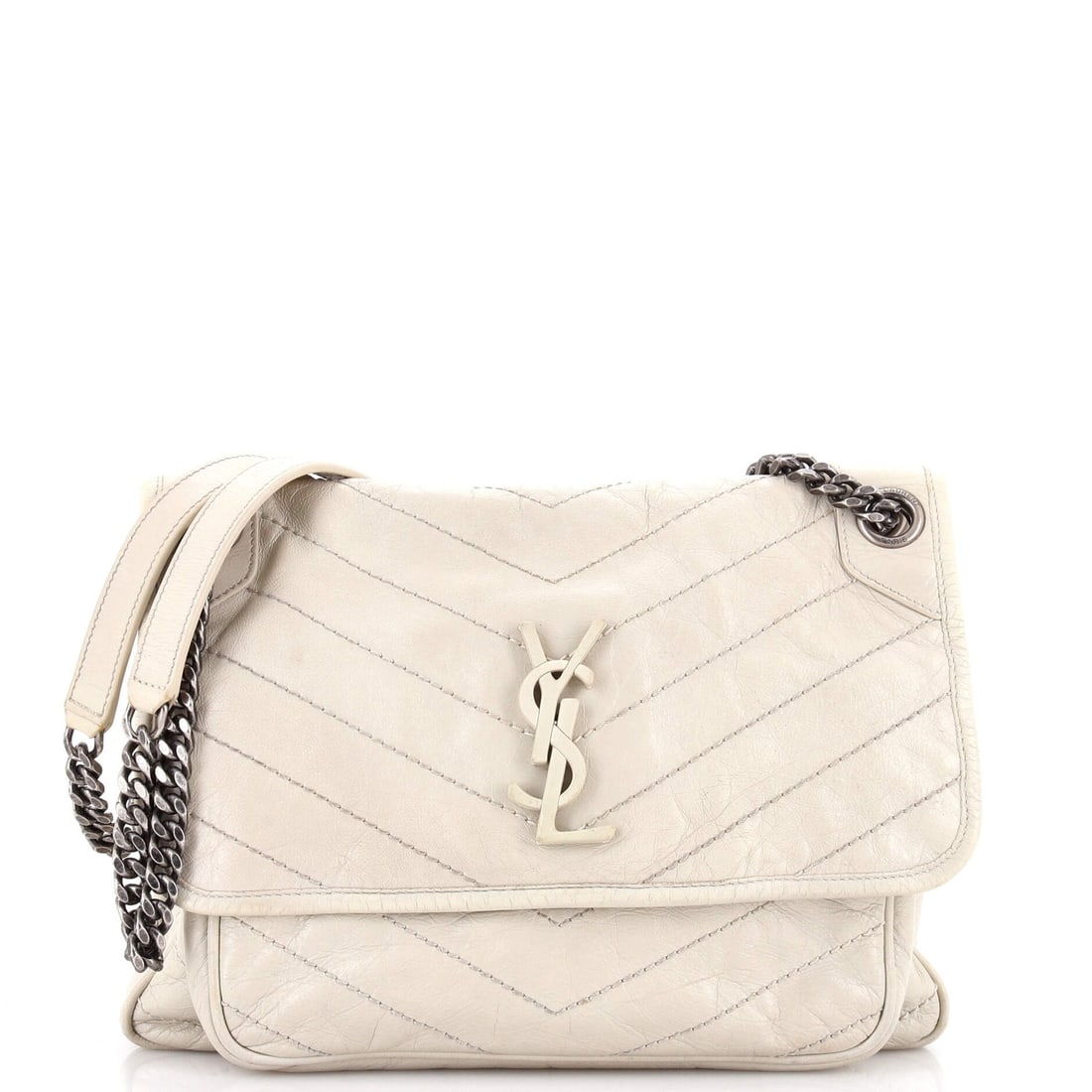 Matelasse Chevron Leather Chain Flap Bag Saint Niki Medium: Matelasse Chevron Leather Chain Flap Bag Saint Niki Medium The Saint Laurent Matelasse Chevron Leather Chain Flap Bag Niki Medium boasts a striking neutral white exterior adorned with intricate matela