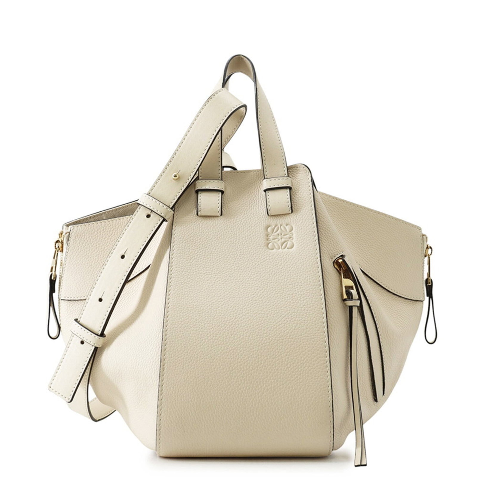Handbag Leather from Loewe: Handbag Leather from Loewe This luxurious handbag features high-quality leather from renowned Spanish brand Loewe, crafted with attention to detail and a classic design. The ivory color and gold hardw