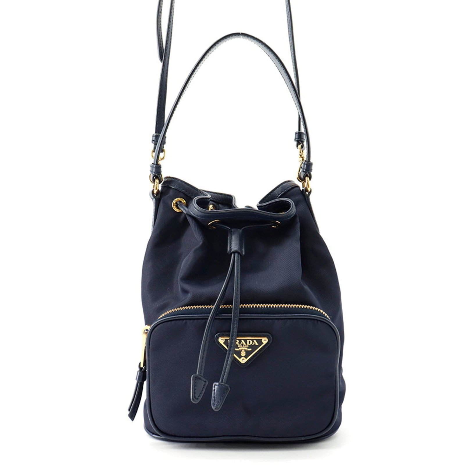 Nylon leather handbag by Prada: Nylon leather handbag by Prada Nylon leather handbag by Prada, featuring a navy color and sleek design. Made from high-quality materials, this bag measures 23cm x 17.5cm x 11cm. A stylish accessory fo