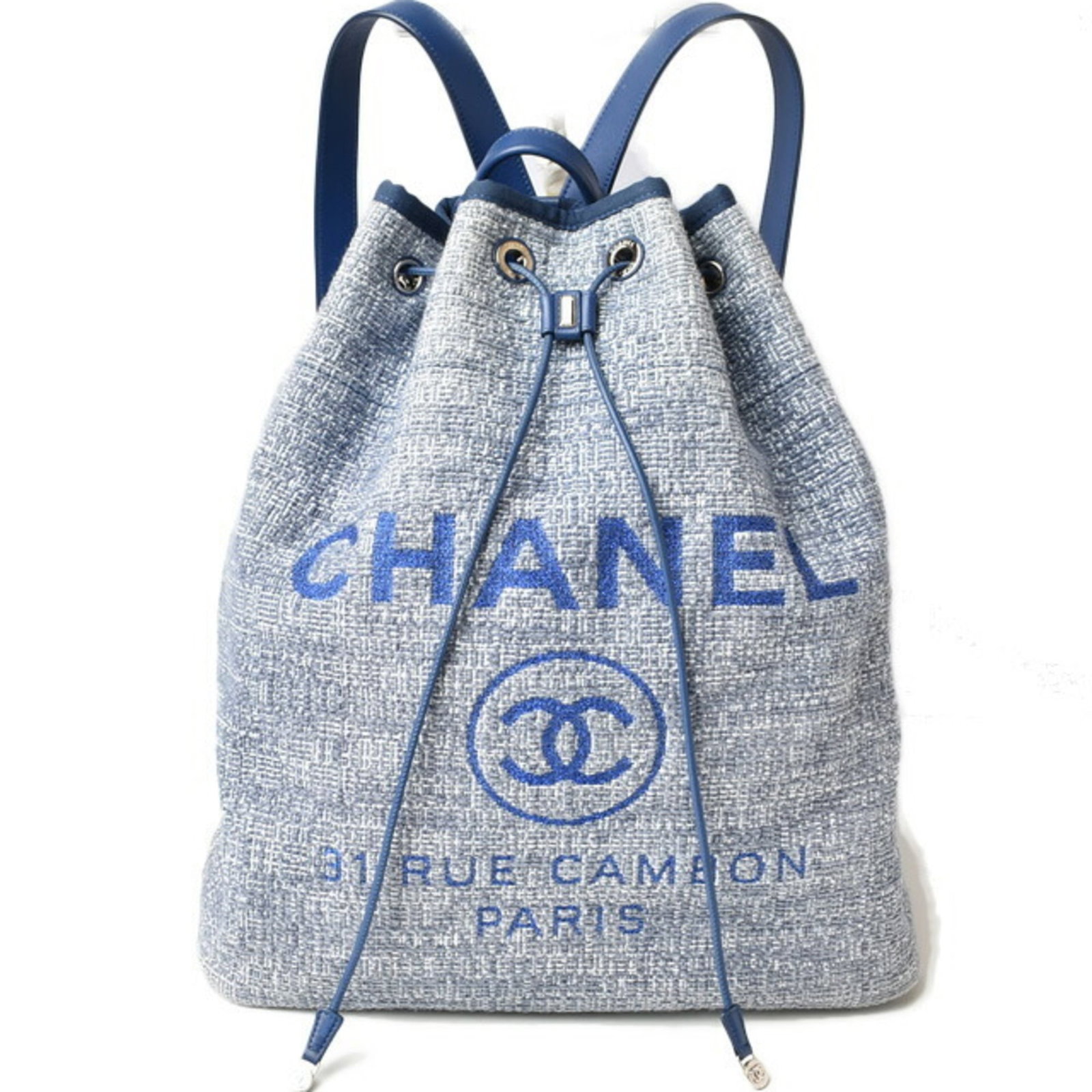 Canvas Cotton Denim Backpack Chanel: Canvas Cotton Denim Backpack Chanel Canvas Cotton Denim Backpack by Chanel, featuring a unique blend of cotton canvas and denim materials. This stylish backpack boasts a zipper pocket for added conven