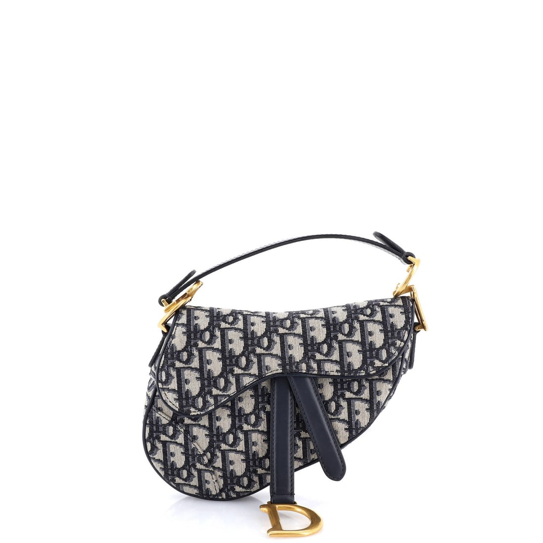 Canvas mini handbag saddle Oblique Christian Dior: Canvas mini handbag saddle Oblique Christian Dior Canvas mini handbag saddle Oblique Christian Dior features a striking blue canvas exterior with neutral interior, adorned with aged gold hardware. The