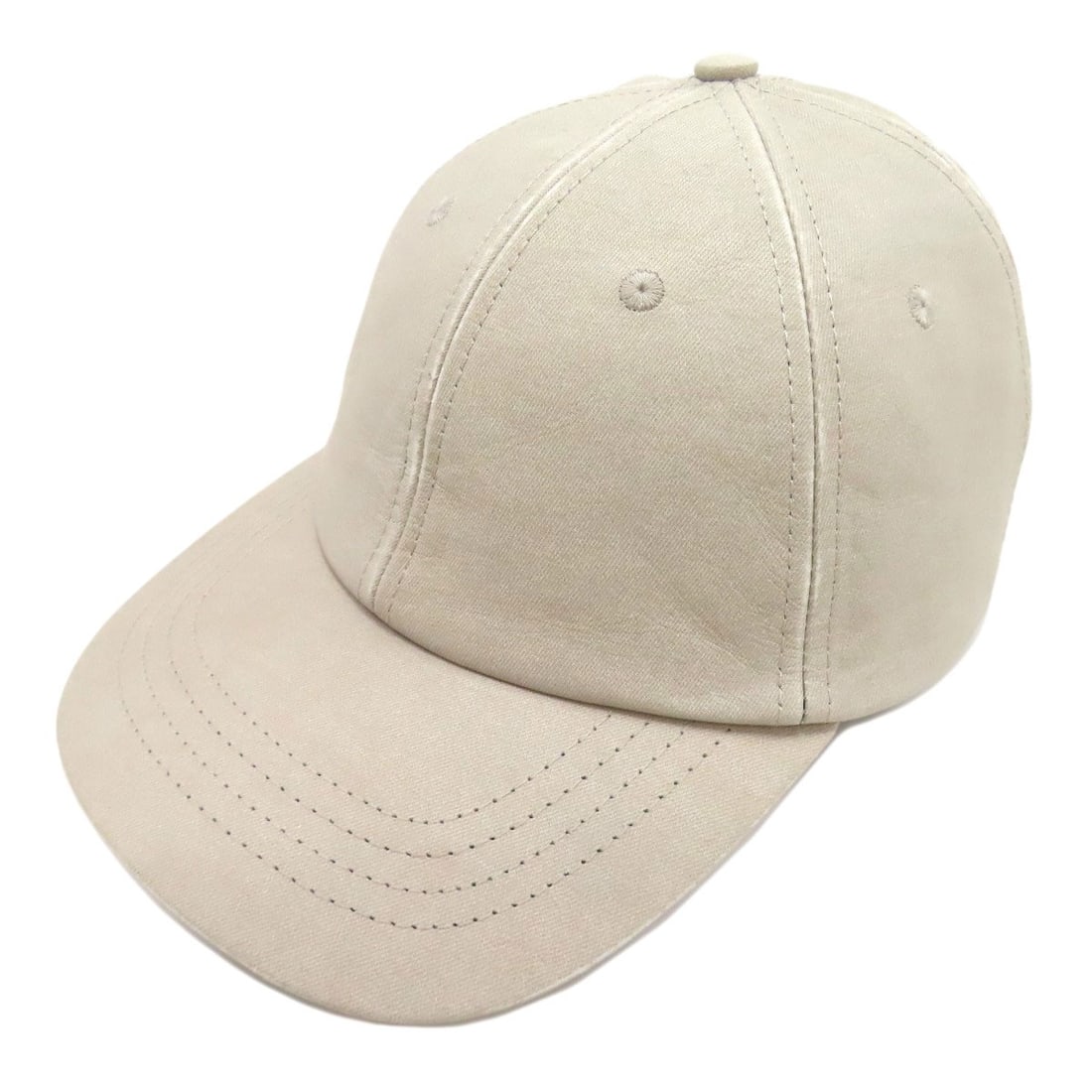 Veneta Bottega Leather Hat Jersey Print: Veneta Bottega Leather Hat Jersey Print Beige leather hat with jersey print, bearing a signature. Made from high-quality materials, this Bottega Veneta accessory features a classic design. A stylish a