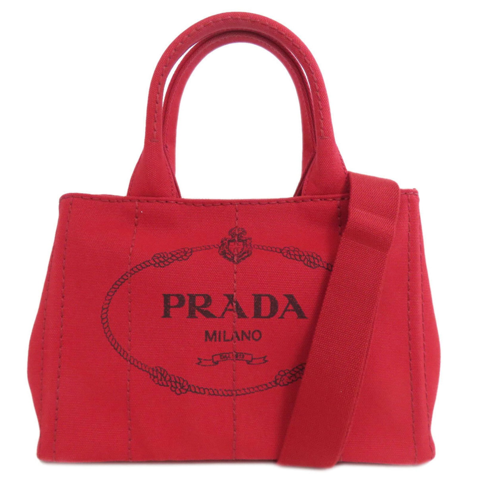 Handbag Canapa Prada: Handbag Canapa Prada Red Canapa Prada Handbag with Zipper and Open Pockets. This stylish handbag features a striking red color, zipper pocket, and open pockets for added functionality. Measuring 19.5c